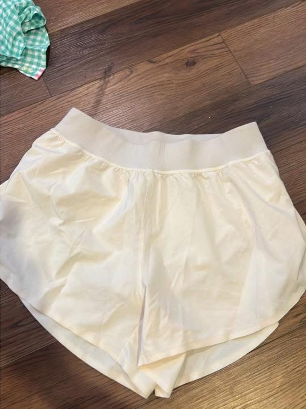 CRZ YOGA Cream Women's Athletic Shorts - dolphin hem